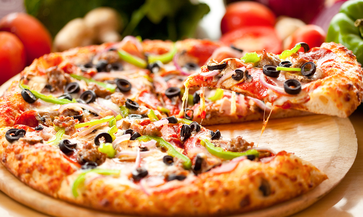 Afhaal: medium pizza + drankje naar keuze